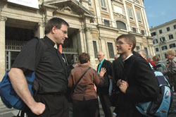 Father Thomas Schliessmann, left, pastor of St. Rose of Lima Parish in Franklin and Holy Trinity Parish in Edinburgh, chats on Oct. 14 with seminarian Sean Danda on the steps of St. Mary Major Basilica in Rome during the archdiocesan pilgrimage to Italy for the canonization of St. Theodora Guérin.