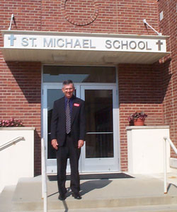 A month after he retired in 2006, Ken Saxon returned to work as the principal of St. Michael School in Brookville, the school where he has re-learned how different and special a Catholic education is. (Submitted photo) 