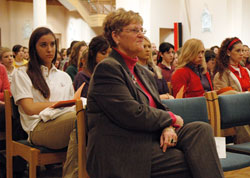 Annette “Mickey” Lentz, executive director of the archdiocesan secretariat for Catholic education and faith formation, sits among the approximately 1,000 students from Catholic schools from across the archdiocese during a Catholic Schools Week Mass celebrated on Jan. 31, 2007, at SS. Peter and Paul Cathedral in Indianapolis. (File photo by Sean Gallagher)