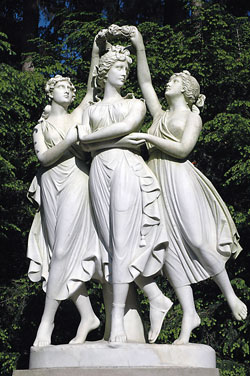 This Grecian sculpture of three women is among the ornate statues on the elegant and historic grounds of the Indianapolis Museum of Art adjacent to West 38th Street and Michigan Road in Indianapolis. (Photo by Mary Ann Wyand)