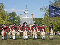 Costumed interpreters dressed in Revolutionary War uniforms play fifes and drums during a historical re-enactment program in Colonial Williamsburg, where guests experience the challenges of creating a new, self-governing society. (Photos courtesy Colonial Williamsburg Foundation©)