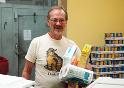 St. Thomas Aquinas parishioner Mark Varnau of Indianapolis has led the efforts of five parishes and 75 volunteers to create a new St. Vincent de Paul Society food pantry that is already helping feed about 500 Indianapolis families a month. (Photo by John Shaughnessy)