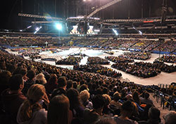 Some 23,000 Catholic teenagers and chaperones listen on Nov. 21, 2015 in Lucas Oil Stadium in Indianapolis as Cardinal Oscar Rodriguez Maradiaga of Tegucigalpa, Honduras, preaches a homily during the closing Mass of the National Catholic Youth Conference (NCYC) held at the stadium and the adjacent Indiana Convention Center. (File photo by Sean Gallagher)