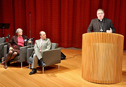Rabbi Paula Winnig, left, executive director of the Jewish Bureau of Education in Indianapolis, and Rev. Dr. Matthew Myer Boulton, president of Christian Theological Seminary, listen as Archbishop Joseph W. Tobin addresses participants in the Interfaith Voices for the Earth: Our Common Home panel discussion on March 12 at Christian Theological Seminary in Indianapolis. (Photo by Natalie Hoefer)