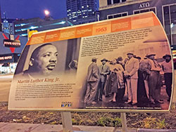 On the southeast corner of East Washington and Pennsylvania streets in Indianapolis, a memorial honors the life and work of Rev. Martin Luther King Jr. The memorial includes this plaque, among other elements. (Photo by Natalie Hoefer)
