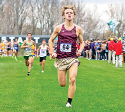 Cameron Todd of Brebeuf Jesuit Preparatory School in Indianapolis surges toward victory in Indiana’s cross country state championship meet for boys in Terre Haute on Oct. 28. (Submitted photo)