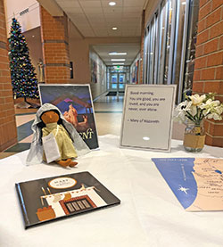 Through the Hallow app’s “Mary on the Mantel” program, the principal of St. Malachy School in Brownsburg, Saundra Kennison, received a Mary doll, advice messages for students and a book last Advent to help students prepare for Christmas. The school partnered with Hallow to offer accounts to students and their families as a means to grow in the faith at school and at home. (Submitted photo)