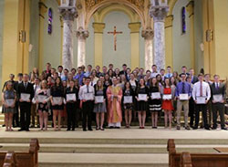 Bishop Charles C. Thompson, front row center, stands with 2016 recipients of the Diocese of Evansville's St. Maria Goretti Youth Distinction.