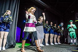 The Logan Center’s Best Buddies program partners Logan clients with students from the University of Notre Dame. The center’s fashion show highlights the Best Buddies volunteers.