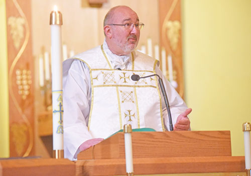 Father Daniel Mahan preaches a homily during an April 27, 2023, Mass at St. Mary of the Immaculate Conception Church in Aurora. He currently serves as director of the Institute on the Catechism of the U.S. Conference of Catholic Bishops. (File photo by Sean Gallagher)