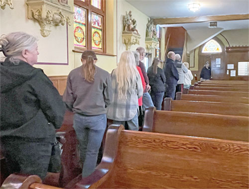 People stand in line for the sacrament of penance on Feb. 20 at St. Mary of the Immaculate Conception Church in Aurora, where the sacrament is made available from 9 a.m.-9 p.m. every third Friday of the month in an initiative called &ldquo;12 Hours of Grace.&rdquo; (Submitted photo)