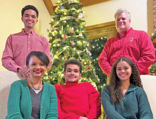 Grace Trahan-Rodecap and her husband Joe pose with their children for a family photo at Christmas. In the front row are Grace, left, Christian and Rachel. In the back row are Nicholas, left, and Joe. (Submitted photo)