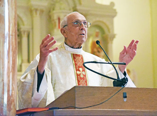 Father Paul Landwerlen preaches a homily during a May 4 Mass at St. Joseph Church in Shelbyville that celebrated the 70th anniversary of his ordination as an archdiocesan priest. (Photo by Sean Gallagher)
