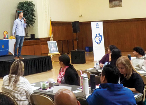 International speaker Evan Lemoine addresses participants during the “Heal to Love” conference for Latinos at the Archbishop Edward T. O’Meara Catholic Center in Indianapolis on July 19. (Submitted photo)