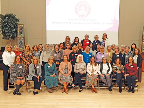 Members of the Catholic Women&rsquo;s Giving Circle who attended the Oct. 29 awards dinner at the Archbishop Edward T. O&rsquo;Meara Catholic Center pose for a group photo. (Photo by Mike Krokos)