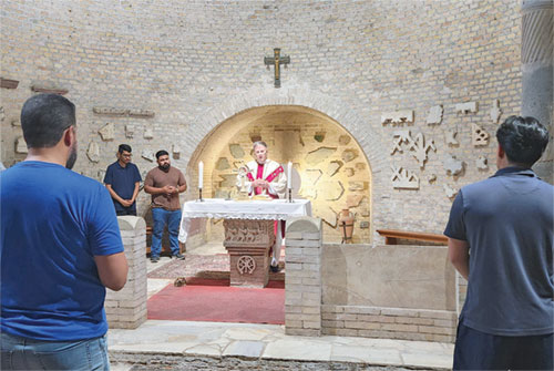 Father Michael O&rsquo;Mara, pastor of Holy Spirit Parish in Indianapolis, celebrates Mass on June 24 in a chapel in the Catacomb of Priscilla in Rome for participants in a pilgrimage to Italy and Poland sponsored by the Indianapolis East Deanery faith community. Holy Spirit sponsored three pilgrimages during the Church&rsquo;s Jubilee Year of Hope. (Submitted photo)