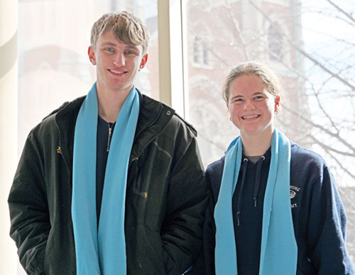 Clay Eckstein and Bridgette Ehrhard, seniors at Oldenburg Academy of the Immaculate Conception in Oldenburg, smile in the Indiana Convention Center in Indianapolis before joining the Indiana March for Life on the city&rsquo;s downtown streets on Jan. 22. (Photo by Natalie Hoefer)