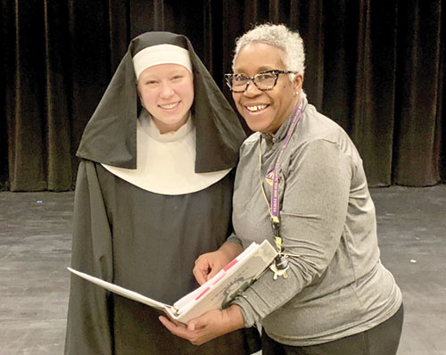 As the writer of the new musical, Providence: A Love Story, Marcia Murphy, right, shares the stage with Lilah Cruz, who plays St. Theodore Gu&eacute;rin in the production that will be performed on March 6, 7, 13 and 14 at St. Theodore Guerin High School in Noblesville, Ind., in the Lafayette Diocese. (Photo by John Shaughnessy)