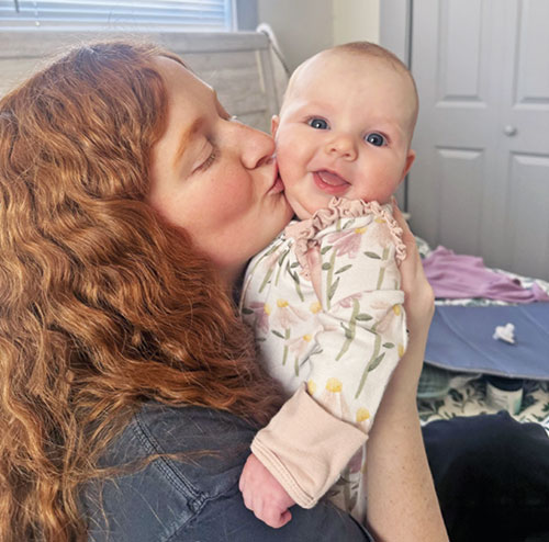 Roarke&nbsp;LaCoursiere shares a tender moment with her first child, 7-month-old Ruth. (Submitted photo)