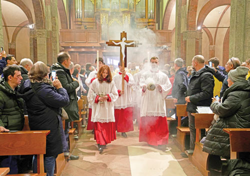 Altar servers process into the Basilica of San Babila in Milan at a Mass marking the arrival of the &ldquo;Cross of Athletes&rdquo; on Jan. 29. The cross was entrusted to the Archdiocese of Milan by Athletica Vaticana, the Holy See&rsquo;s sports association, ahead of the 2026 Winter Olympic and Paralympic Games in Milan and Cortina d&rsquo;Ampezzo. (OSV News photo/Archdiocese of Milan)