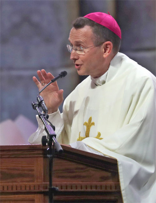 Bishop Andrew H. Cozzens of Crookston, Minn., chairman of the board of the National Eucharistic Congress Inc., announces July 21, 2024 -- the final day of the National Eucharistic Congress at Lucas Oil Stadium in Indianapolis -- that a Eucharistic pilgrimage from Indianapolis to Los Angeles is being planned for spring 2025. Congress organizers were also considering holding an 11th National Eucharistic Congress in 2033. (OSV News photo/Bob Roller)
