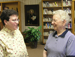 Benedictine Sisters Julie Sewell, left, and Mildred Wannemuehler chat at Our Lady of Grace Monastery, their religious community’s home in Beech Grove.  