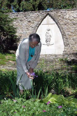 Carmelite Sister Jean Alice McGoff, prioress, enjoys spending time in the gardens at the Monastery of the Resurrection. (Photo by Mary Ann Wyand)