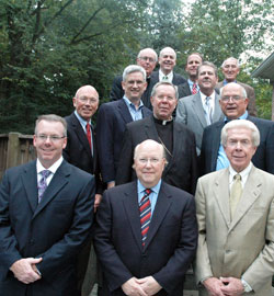 Members of the Legacy for Our Mission: For Our Children and the Future Campaign pose at the Indianapolis home of campaign chair Jerry Semler on Sept. 29. The cabinet members are, front row, from left, John Duffy, Thomas Hirschauer and L. H. Bayley; second row, Eugene Tempel, Archbishop Daniel M. Buechlein and Jerry Semler; third row, David Milroy and Richard Pfleger; fourth row, Msgr. Joseph F. Schaedel and Joseph Therber; fifth row, William McGowan and Timothy McGinley. (Photo by Sean Gallagher) 