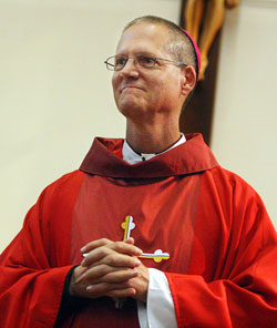 Bishop-designate Paul D. Etienne smiles during an Oct. 19 Mass that he celebrated at St. Mary Cathedral in Cheyenne, Wyo. He was in Cheyenne to meet with staff members of the Diocese of Cheyenne and members of the local media after Archbishop Pietro Sambi, apostolic nuncio to the United States, announced earlier that day that Pope Benedict XVI had appointed Bishop-designate Etienne the new bishop of Cheyenne. (Photo courtesy of Michael Smith/WTE) 