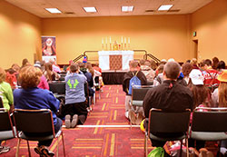National Catholic Youth Conference participants pray before the Blessed Sacrament on Nov. 20 in the adoration chapel at the Indiana Convention Center. (Photo by Natalie Hoefer)