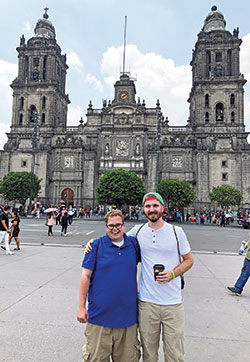 Archdiocesan seminarians Matthew Perronie, left, and Tyler Huber pose in front of the Basilica of Our Lady of Guadalupe in Mexico City last summer when both seminarians were in Mexico to learn Spanish and continue their priestly formation. (Submitted photo)