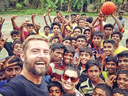 Matt and Nikki Javit share in the joy on a day when they brought sports equipment to the youths of a Catholic orphanage in southern India, one of the many places they visited during an 800-day trip across the globe that deepened their appreciation of humanity. (Submitted photo)
