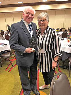 Glenn Tebbe and his wife Laura Jo are all smiles after he received the 2019 INPEA Legislative Leadership Award last September in Indianapolis. (Submitted photo)