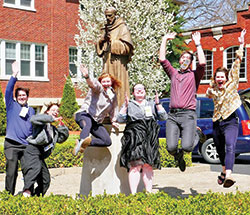 Young adults from the archdiocese show their joy—and their jumping ability—during a spontaneous moment at the archdiocesan young adult retreat on April 3, a weekend retreat that took place at the Mount Saint Francis Center for Spirituality in southern Indiana. The group includes Brendan White, left, Anna Jirgal, Emily Burnham, Taylor Morrone, Matt Morrone and Emily Mastronicola. (Submitted photo)