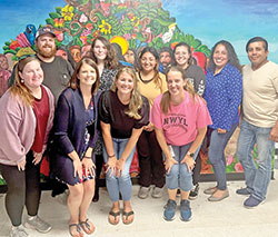 Members of St. Michael Parish in Charlestown pose during an Aug. 16 bilingual catechist workshop at St. Mary Parish in New Albany. They are, from left in the front row, Laura Kinder, Jessica Sarver, Jennie Lathem and Christina Smith. From left in the second row, Nick Smith, Haley Cady, Abigail Martinez, Evangelina Delgado Veliz, Luz Elena Niño-Melchor and Gerardo Pascual. (Submitted photo)