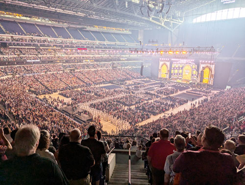 Seminarians, deacons and priests process on July 21 into Lucas Oil Stadium in Indianapolis for the closing Mass of the 10th National Eucharistic Congress. (Photo by Sean Gallagher)