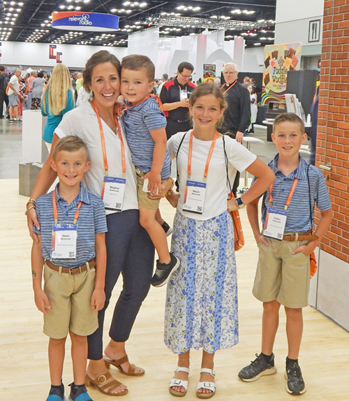 The McDonnell family—Owen, left, Meghan, Evan, Maura and Colton—are all smiles as they enjoy their time at the National Eucharistic Congress on July 18. (Photo by Mike Krokos)