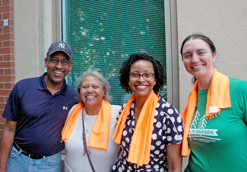Bob Willoughby, his wife Santiaga, their daughter Ambrosia, and her friend Alison Vigland pose for a photo as they prepare to enter the Indiana Convention Center in Indianapolis for the National Eucharistic Congress. (Photo by John Shaughnessy)