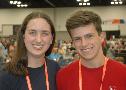 Siblings Kathryn and John Tiplick share a smile at the National Eucharistic Congress in Indianapolis on July 18 after she shared her story of how they—and a group of stuffed animals—combined as children to lead a young adult to the Catholic Church. (Photo by John Shaughnessy)
