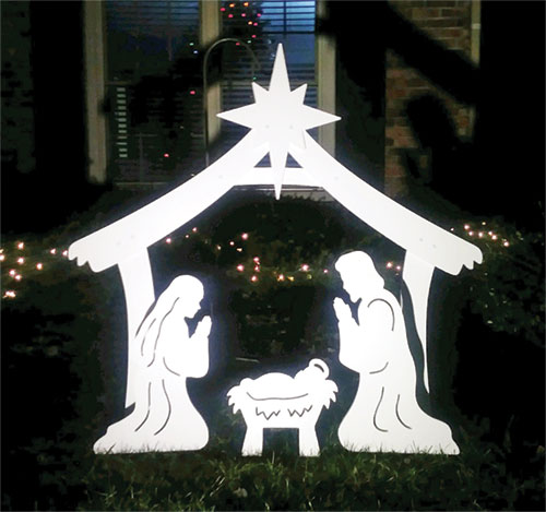 A Project Outdoor Nativity Scene adorns a front yard at Christmastime. (File photo by Mike Krokos)