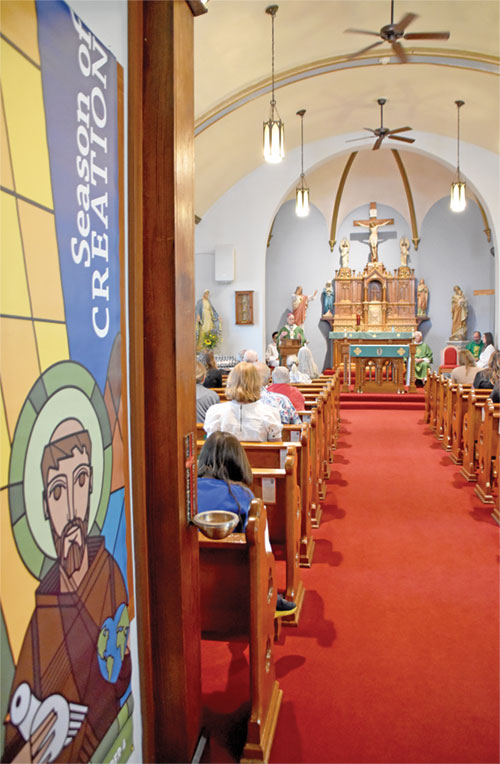 Archbishop Charles C. Thompson delivers a homily in St. Thomas the Apostle Church in Fortville during the archdiocese’s Season of Creation Mass on Sept. 4. (Photo by Natalie Hoefer)