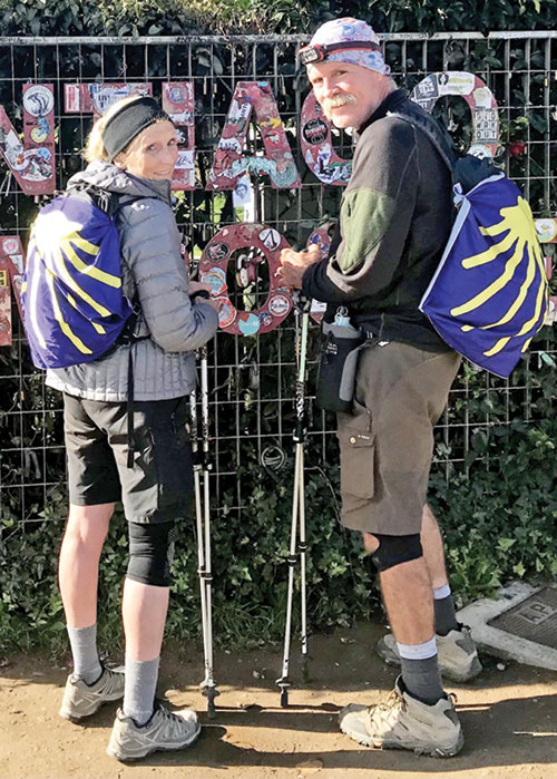 Cindi and Bob Klee of Christ the King Parish in Indianapolis post a photo of Bob&rsquo;s mom on a fence during their 2021 journey on the Camino, a pilgrimage they dedicated to the memory of his late mother. (Submitted photo)