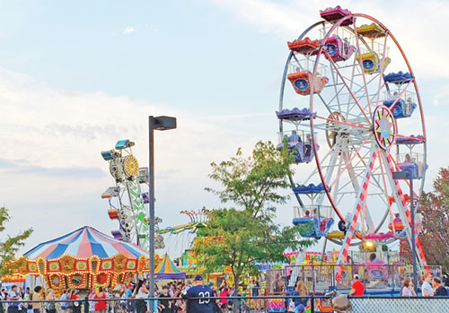 Carnival rides fill the midway at the Country Fair and Hog Roast festival at St. Malachy Parish in Brownsburg on Sept. 20, 2025. (Photo by Natalie Hoefer)