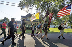 The pilgrims leave Otterbein after Mass celebrated at St. Charles Church there. (Photo by Carolyn B. Mooney)