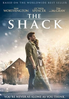 two people standing in front of a shack DVD cover photo